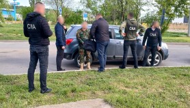 FOTO // Un militar din Bălți, prins în flagrant cu 1400 de euro