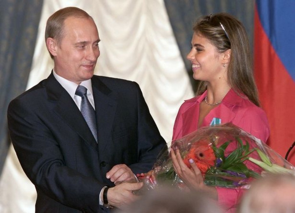 disparuta-fara-urma-fosta-gimnasta-olimpica-cu-medalie-de-aur-care-i-a-nascut-gemeni-lui-vladimir-putin3-1602222894lh4xfsh-1000.jpeg